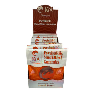 front of display case of Koi Mushroom Peach Razz Psychedelic Muscimind Gummies