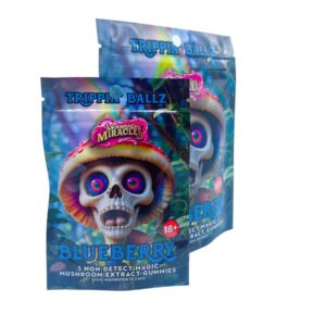 two bags of Trippin Ballz Mushroom Gummies Blueberry 100MG
